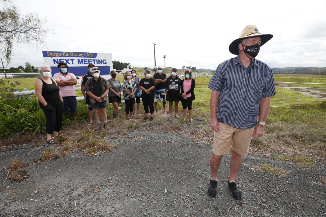 Grant McLeod (right foreground) and the Awakino Point Ratepayers Group want Dargaville racecourse development canned.