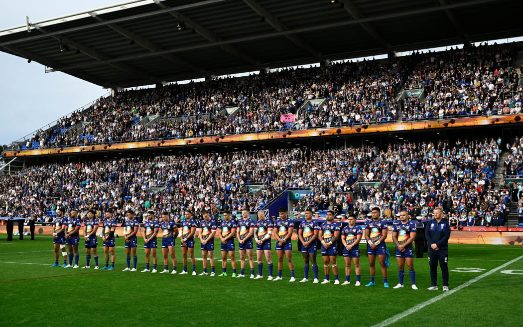 Warriors players stand during the National Anthem. Warriors v Titans. NRL rugby league match, ANZAC round. Telstra Premiership at Go Media Mt Smart Stadium, Auckland, New Zealand. Thursday 25 April 2024. © Photo credit: Andrew Cornaga / www.photosport.nz
