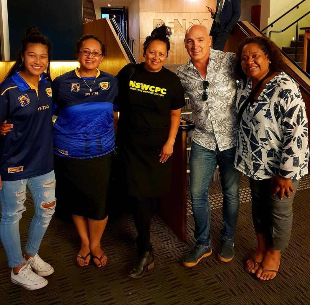 Fiji Bati coach Brandon Costin (2R) at a FNRL hosted screening of the Power Meri film on the PNG Orchids women's team.