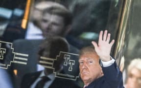 Former US president Donald Trump arrives at Trump Tower in New York on 3 April, 2023. The 76-year-old Republican, the first US president ever to be criminally indicted, was to be formally charged on Tuesday over hush money paid to a porn star during the 2016 election campaign.