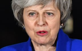 Britain's Prime Minister Theresa May delivers a speech to members of the media in Downing Street in London on January 16, 2019, after surviving a vote of no confidence in her government.