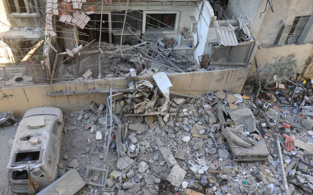 A view of the damage at the site of an overnight Israeli strike on Beirut's southern suburb of Ghobeiry on 30 September, 2024.