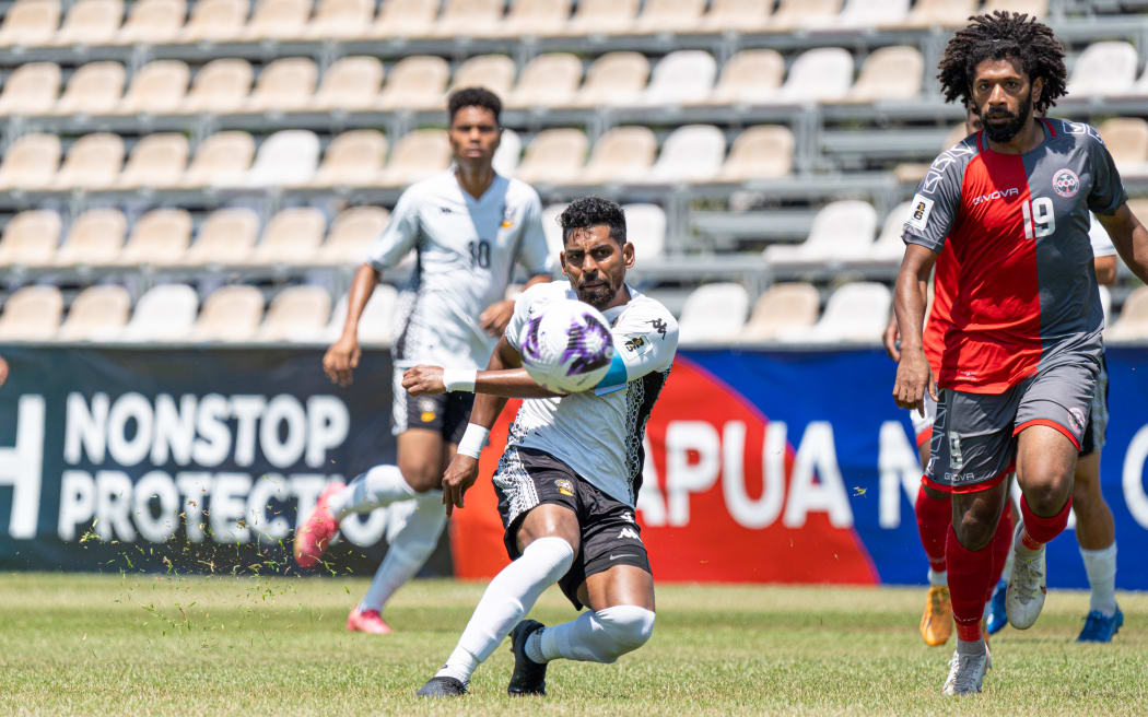 Fiji's Roy Krishna with an attempt at goal against New Caledonia.