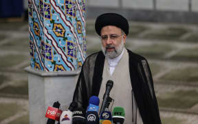 Ebrahim Raisi gives a news conference after voting in the presidential election, at a polling station in the capital Tehran, on June 18, 2021.