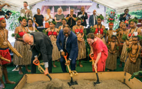 New Zealand High Commissioner to Papua New Guinea, Peter Zwart; Elias Kapavore, PNG Minister for Health; Miriam Carter, Australian High Commission Counsellor.