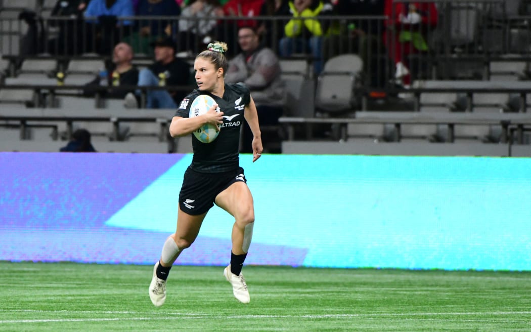 New Zealand's Michaela Brake runs to score another try during the World Rugby Sevens Series women's match against Ireland.