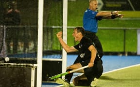 Black Sticks player Kim Kingston scores against Australia 2016.