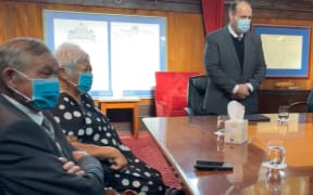 Kiingi Tuheitia Pootatau Te Wherowhero VII and his wife Te Atawhai with Ngira Simmonds wait as manuhiri are welcomed.
