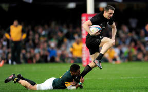 All Black Ben Smith breaks free of Juan de Jongh in record win.
