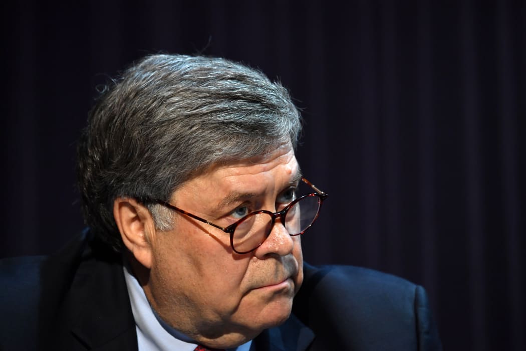 US Attorney General William Barr looks on during a roundtable with US President Donald Trump,faith leaders and small business owners at Gateway Church Dallas Campus in Dallas, Texas, on June 11, 2020.