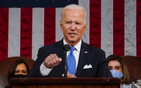 US President Joe Biden addresses a joint session of Congress in the House chamber of the US Capitol 28 April 2021 in Washington, DC.