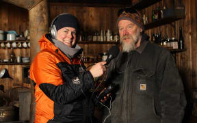 Francesca Eathorne and Al Fastier inside the hut.