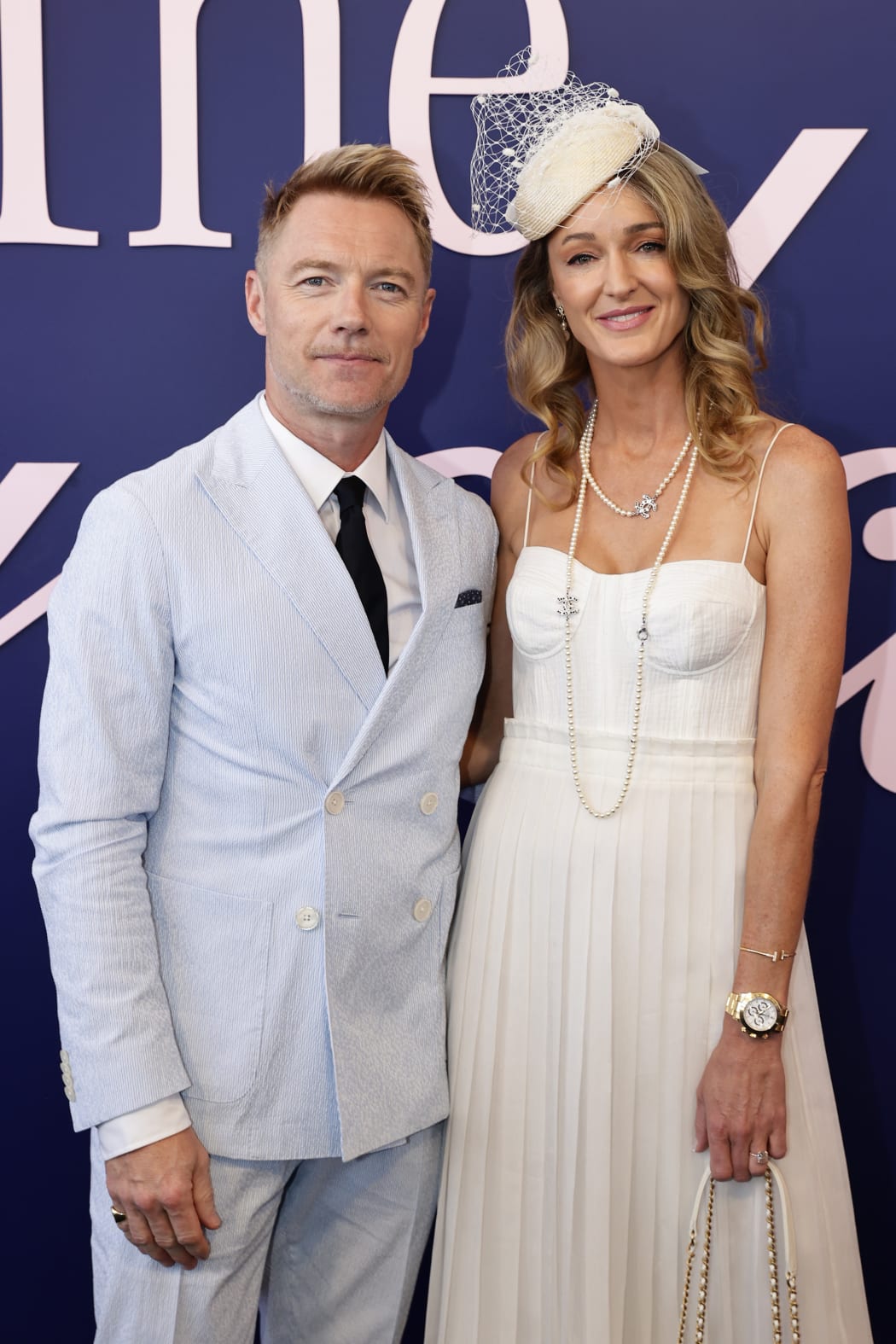 Ronan and Storm Keating and pose for a photo during 2024 Melbourne Cup Day at Flemington Racecourse on November 05, 2024 in Melbourne, Australia.