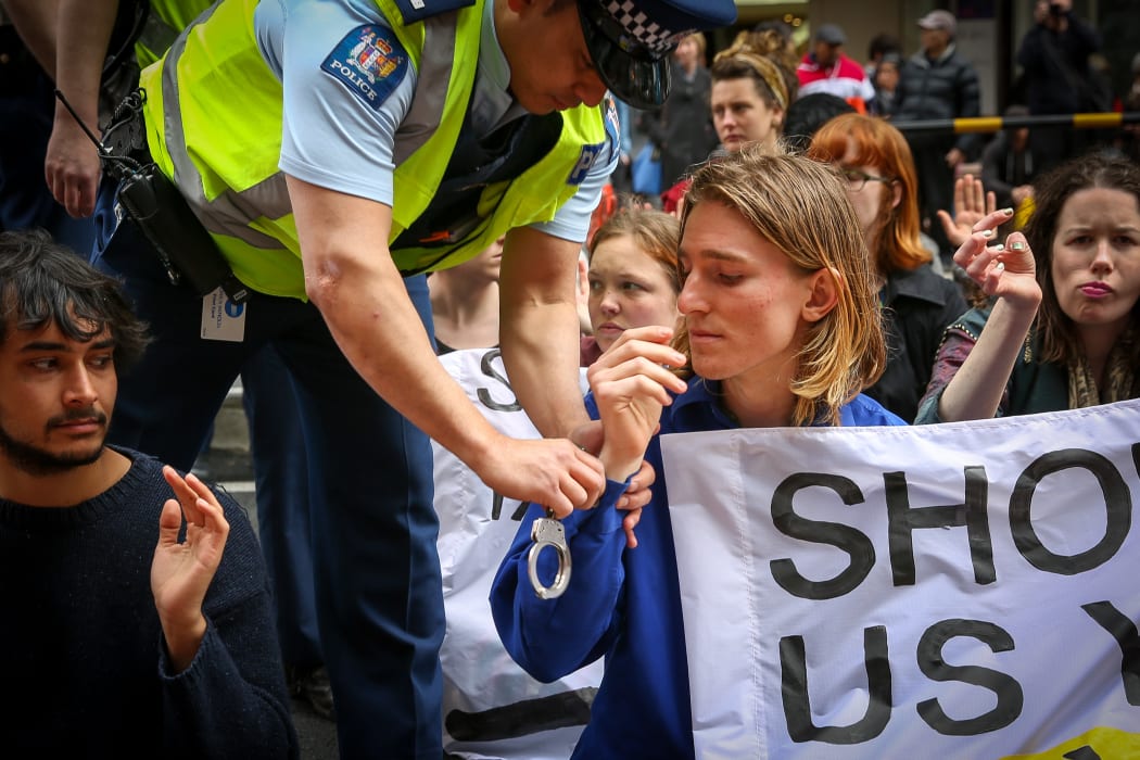 TPPA protesters being arrested.