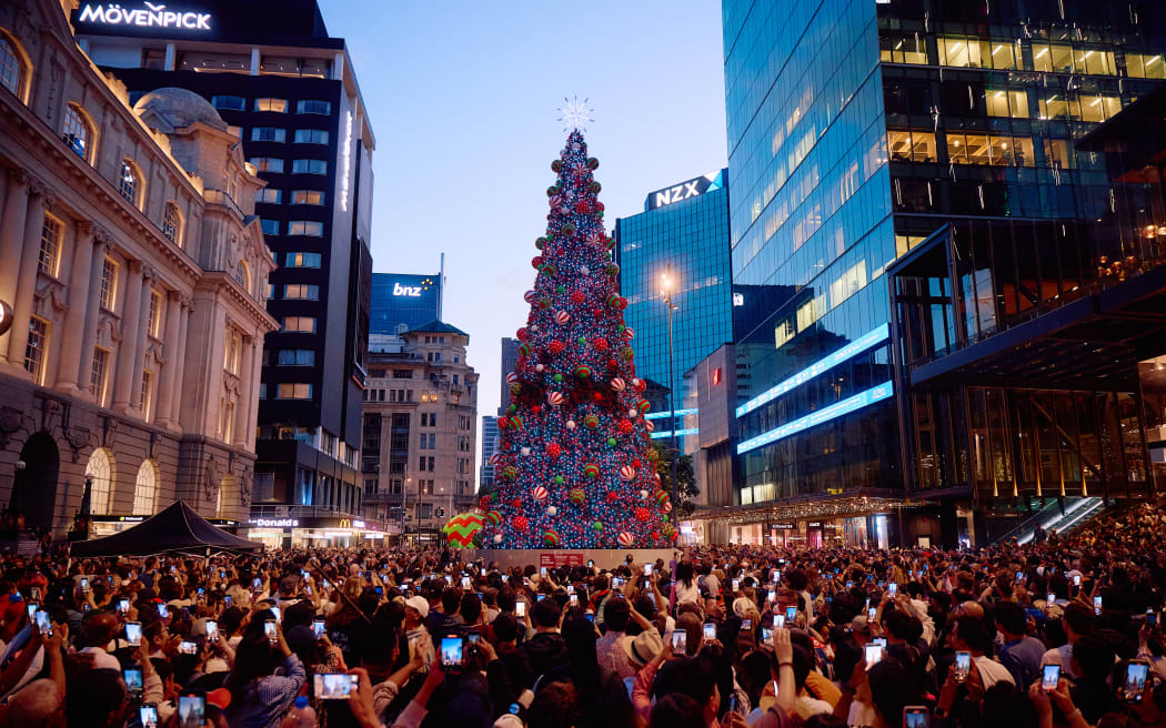 Standing 18.4 metres tall, with a 15-metre steel frame, 2-metre base and 1.4-metre star topper, Te Manaaki's Christmas tree is light up outside Britomart and Commercial Bay.
