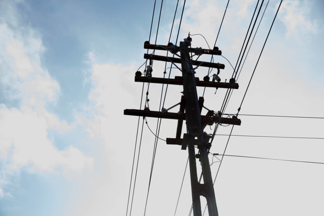 A silhouette of power lines.