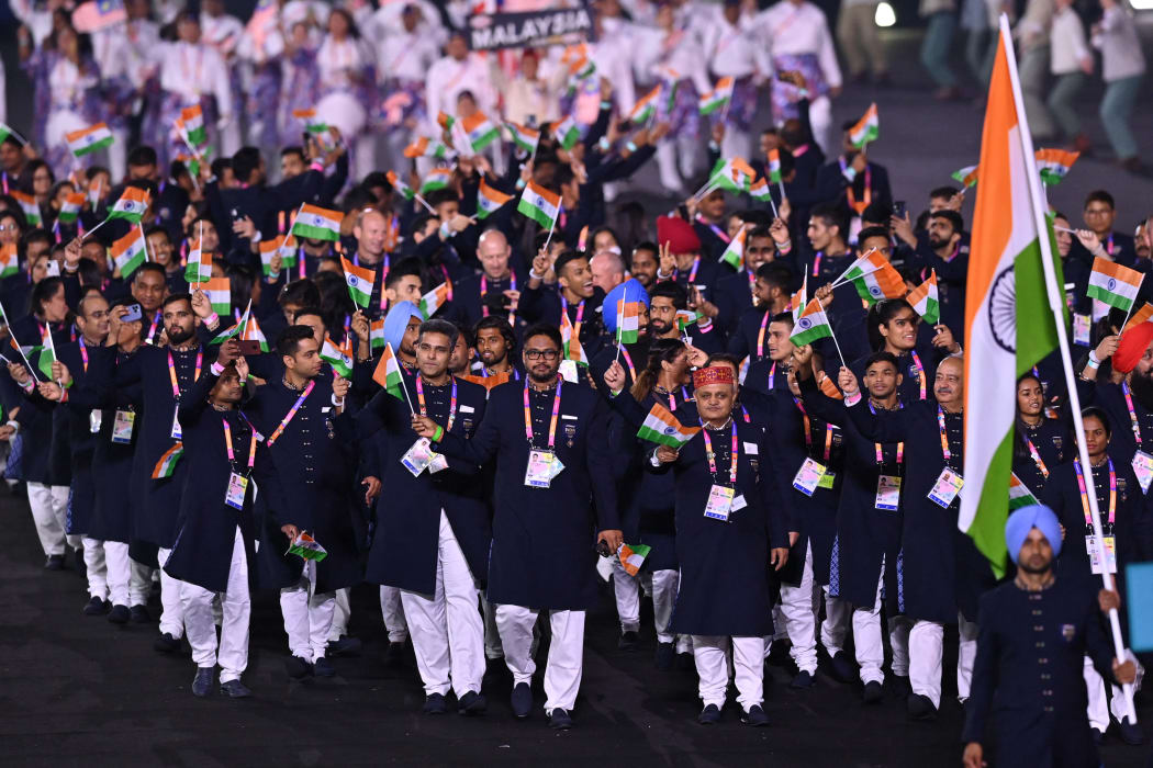 Athletes for Team India take part in the opening ceremony for the Commonwealth Games at the Alexander Stadium in Birmingham, central England, on July 28, 2022. (Photo by Glyn KIRK / AFP)