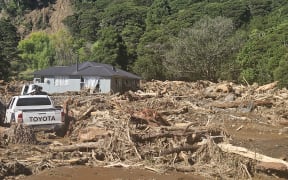 Sjaak van Unnik and Hessel Mulder during Te Araroa floods