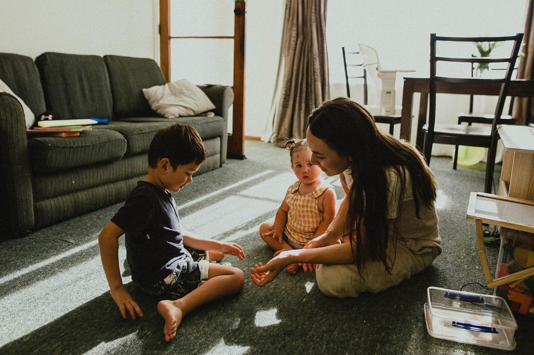 Renee White with her two children.