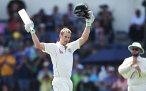 Adam Voges celebrates his century against New Zealand at the Basin Reserve in Wellington.