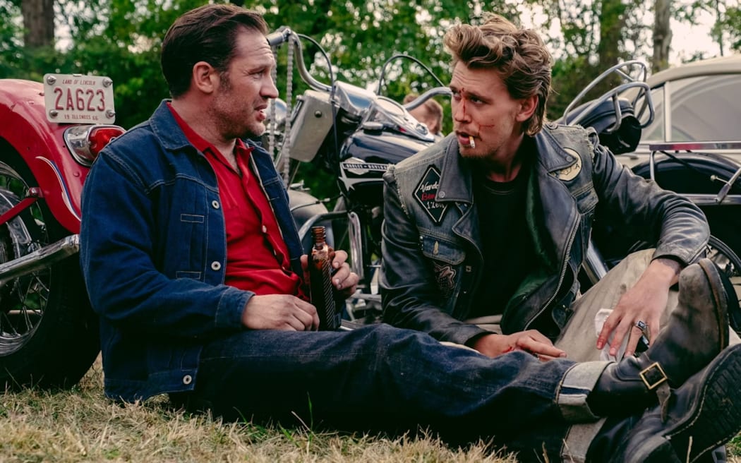 Still from the 2024 drama film The Bikeriders featuring Tom Hardy and Austin Butler