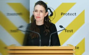 WELLINGTON, NEW ZEALAND - OCTOBER 12: Prime Minister Jacinda Ardern speaks to media during a press conference at Parliament on October 12, 2021 in Wellington, New Zealand.