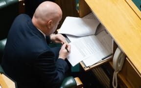 Christopher Luxon adds some last minute details to his Budget Debate speech.