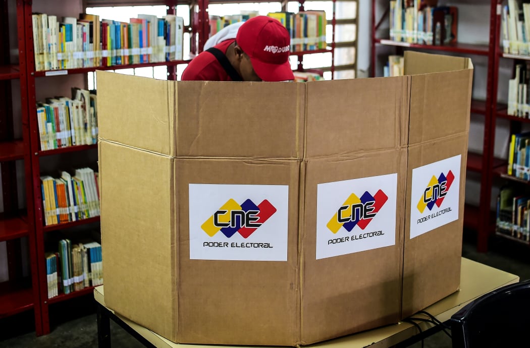 A man casts his vote in the capital, Caracas.