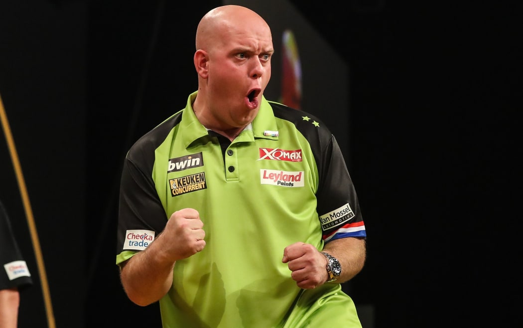 Michael van Gerwen celebrates winning his third World Darts Championship title