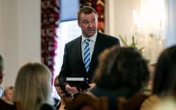 Mark Patterson is sworn in as a government minister, 27 November 2023.