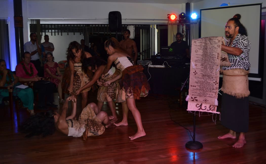 Daren Kamali performing his Masi poem with Vou Dance Fiji at EU Ambassador Andrew Jacobs' residence in Suva.
