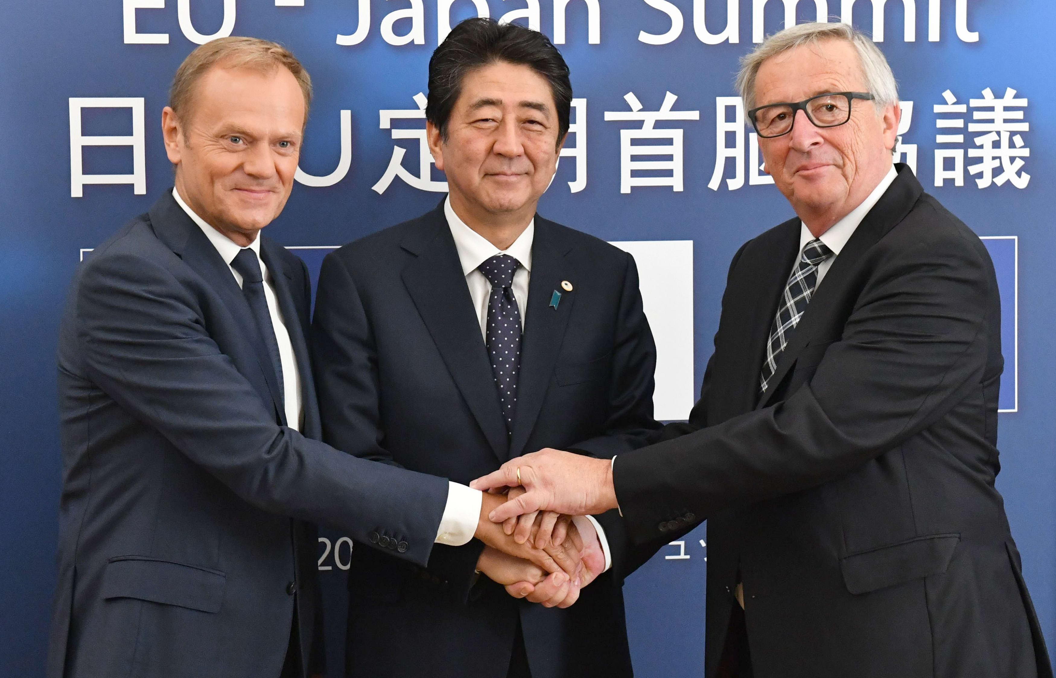 (L-R) European Council President Donald Tusk, Japanese Prime Minister Shinzo Abe, and European Commision President Jean-Claude Juncker.