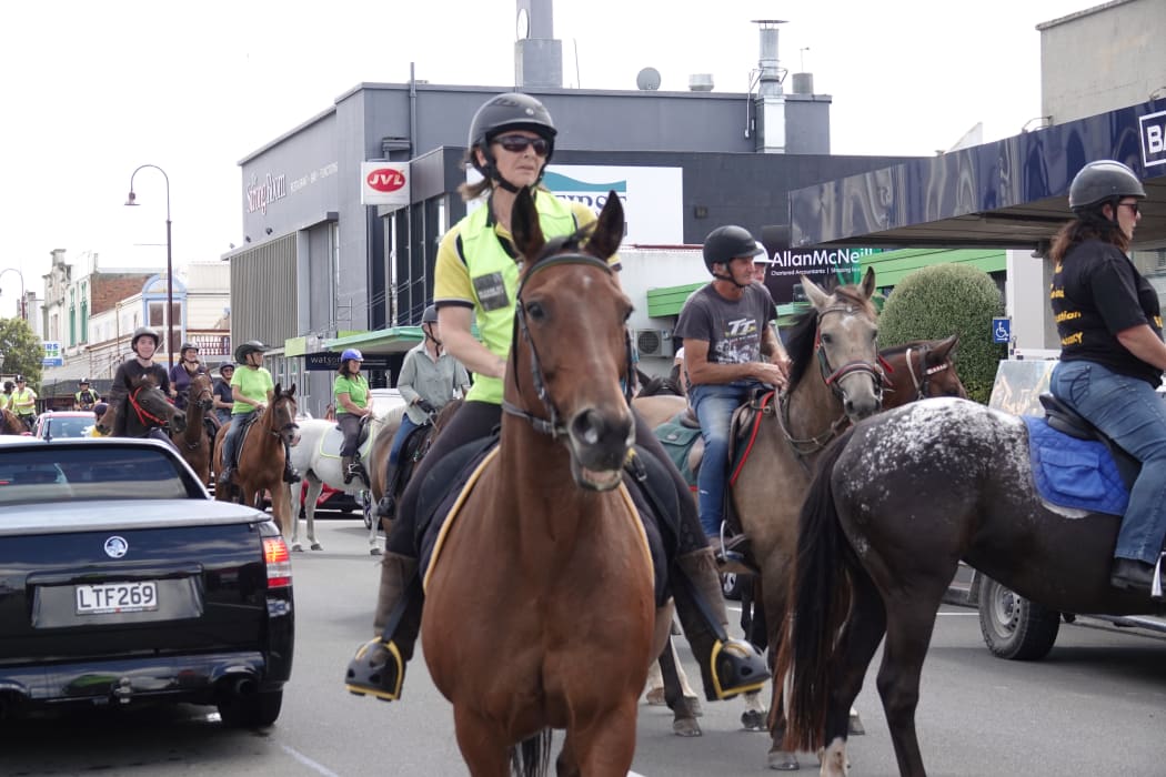 Riders gather at Ian McKelvie’s office.