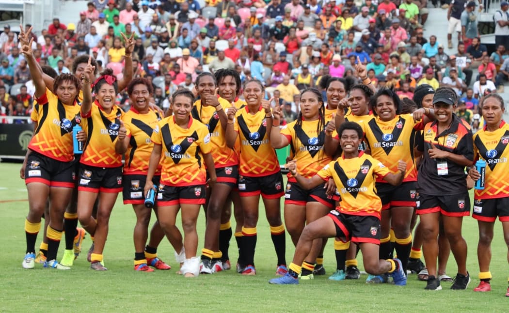 The PNG Orchids celebrate their first ever test match win against England.