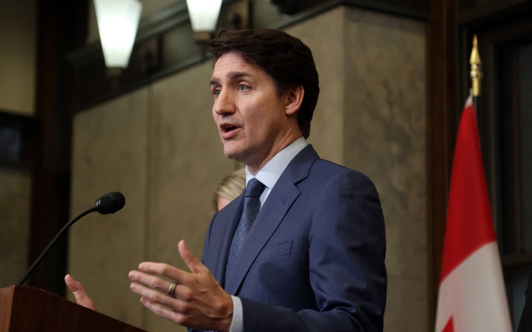 Canada's Prime Minister Justin Trudeau speaks during a news conference about the US tariffs against Canada on March 4, 2025 on Parliament Hill in Ottawa. Trudeau said that President Donald Trump imposed tariffs on Canada to destroy the country's economy to make it easier for the United States to annex its northern neighbor. The extraordinary warning about Trump's threat to Canadian sovereignty came as the US president delivered on his vow to impose 25 percent tariffs on all Canadian goods. (Photo by Dave Chan / AFP)