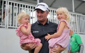 Ryan Fox celebrates with his family after winning the Myrtle Beach Classic in South Carolina.