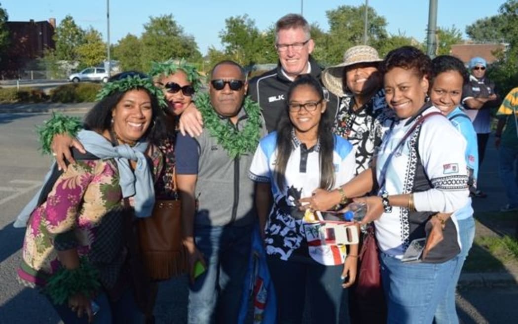 Fiji rugby coach John McKee with some fans.