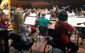 Rehearsals for the NZSO 70th birthday concert with conductor Hamish McKeich