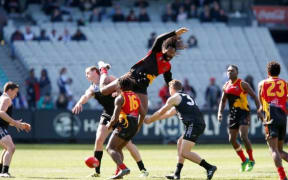 PNG managed to rise above New Zealand in the AFL International Cup final.