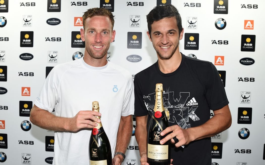 Michael Venus (L) and Mate Pavic after winning the ASB Classic doubles final, Auckland, Saturday 16 January 2016. Copyright Photo: Andrew Cornaga / www.photosport.nz