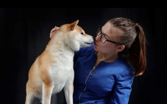 Charly Houtos with Tobi the Shiba Inu