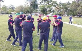 Refugees stuck on PNG's Manus Island play in a cricket tournament.