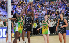Grace Nweke of New Zealand shoots as Phumza Maweni of South Africa tries to stop her during the 2023 Netball Quad Series game between South Africa and New Zealand at the CTICC in Cape Town on 21 January 2023.