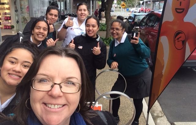 Teacher Jo Cameron and students after they voted.