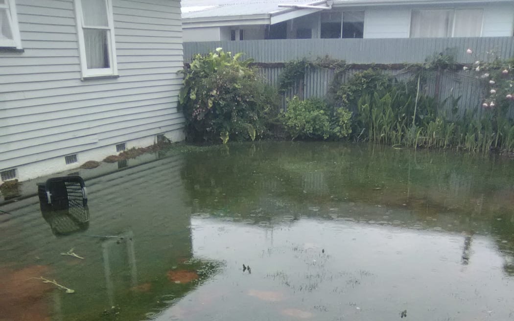 When it rains, residents on Masterton's Cockburn Street get backflows of raw sewage and wastewater and lose ability to use water.
