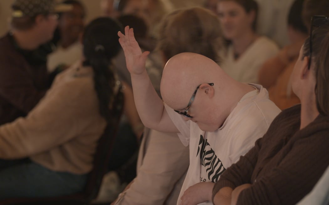 An audience member at Spark Live.