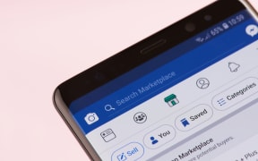 New york, USA - september 21, 2018: Facebook marketplace search bar on smartphone screen background close up view