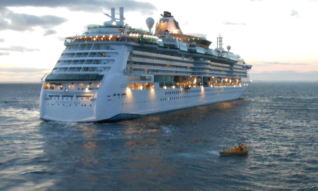 The cruise ship turned back to help rescue authorities locate the body.