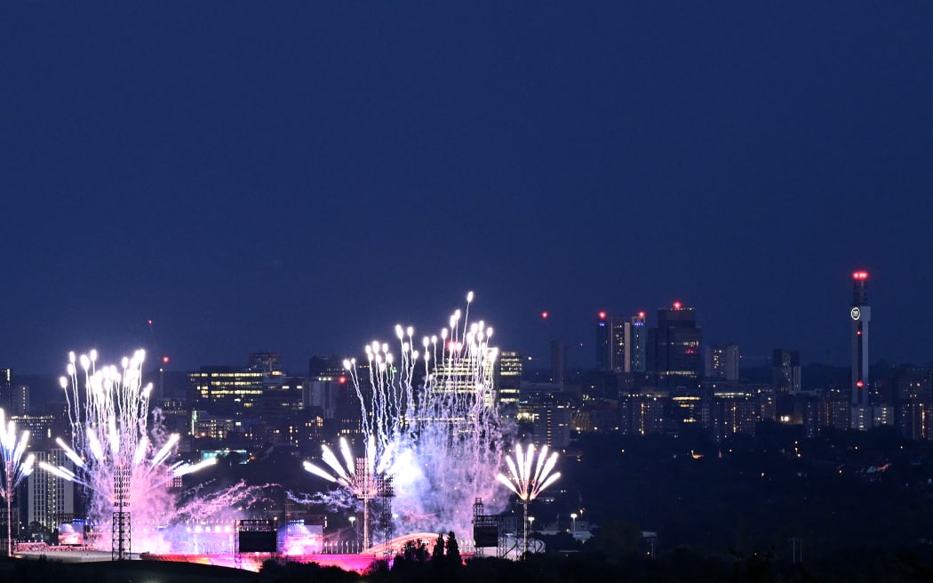 Fireworks erupt over the Alexander Stadium during the closing ceremony for the Commonwealth Games in Birmingham, central England, on August 8, 2022. (Photo by Oli SCARFF / AFP)