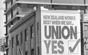 Trades Hall, with union slogan.